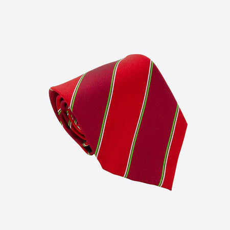 The Martin Berrill Sports Custom Club & School Ties features a red tie with diagonal green and white stripes, neatly rolled on a plain white background—ideal for those seeking bespoke, distinctive ties.