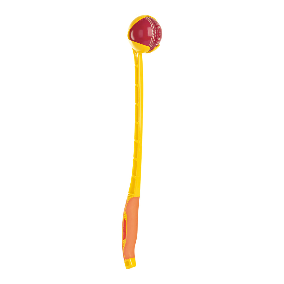 The Sidearm Club Cricket Ball Thrower by Sidearm is a yellow plastic launcher with a curved handle and a red ball in the scoop at the end—ideal for throwing balls long distances, similar to how you'd play fetch with dogs.