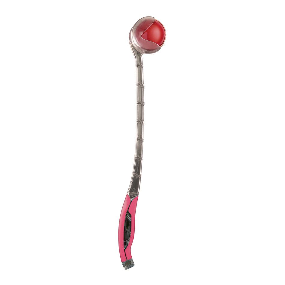 The Sidearm Elite Cricket Ball Thrower by Sidearm is a curved plastic device with a red handle and scoop-shaped end, shown holding a red ball against a white background.