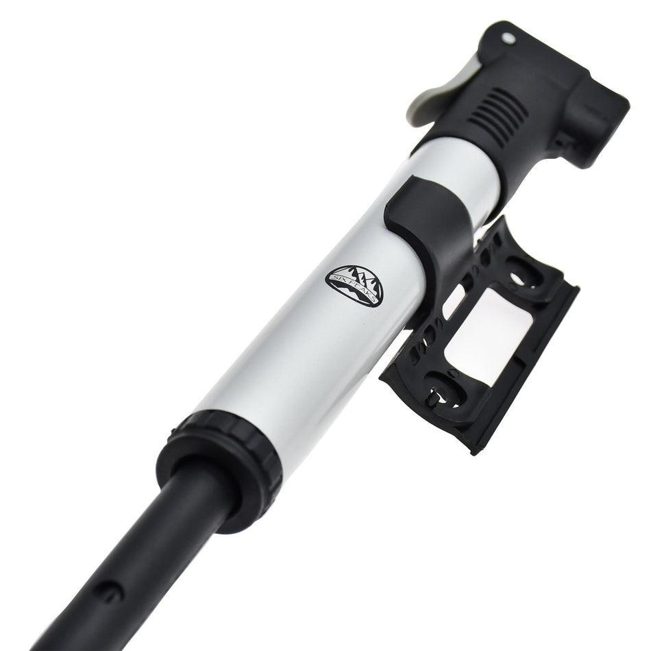 The Six Peaks Cycling Mini Hand Pump by Six Peaks is a compact silver and black bike pump with a mounting bracket, shown against a white background.
