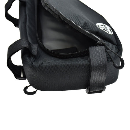 A close-up of the Six Peaks Cycling Triangle Frame Bag by Six Peaks, black with the top flap partially open to show the interior. Straps and loops line the sides, and a round white logo is featured on the flap, ideal for cycling gear storage.
