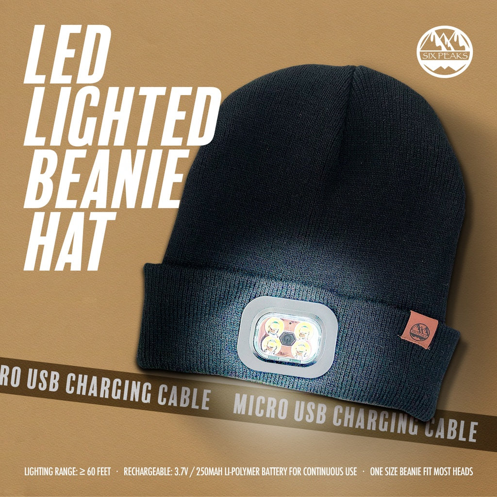The Six Peaks LED Lighted Beanie Hat by Six Peaks is shown on a tan background, featuring a rechargeable headlamp, included micro USB charging cable, long-lasting battery, and one-size-fits-most fit.