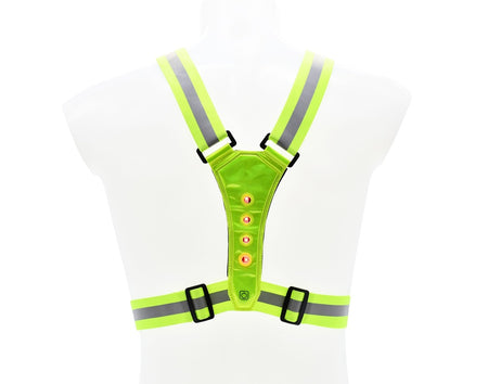 The Six Peaks LED Reflective Vest with Phone Holder features neon yellow fabric, gray stripes, green LEDs, and adjustable black buckles, shown on a transparent mannequin torso for hi-visibility and safety. Brand: Six Peaks.