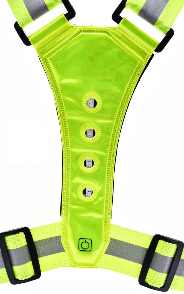 The Six Peaks LED Reflective Vest with Phone Holder features three bright yellow LED lights, black buckles, and a power button symbol for hi-visibility and safety during outdoor activities. Brand: Six Peaks.