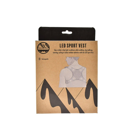 A cardboard box labeled Six Peaks LED Sport Vest features a sketch of a person in this rechargeable safety vest with black mountain silhouettes below and text highlighting visibility for outdoor activities. Brand: Six Peaks.
