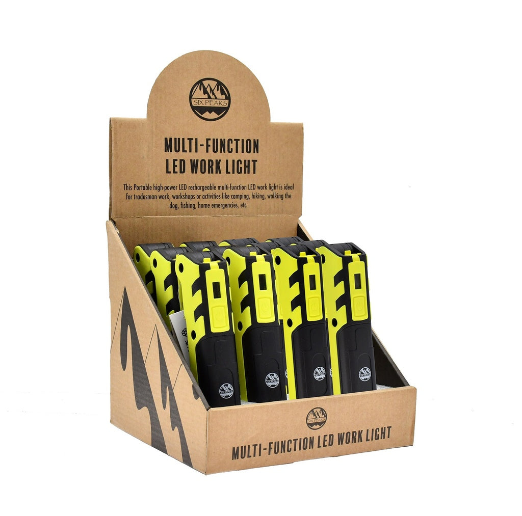 Display box with six upright yellow and black Six Peaks Multi-function LED Work Lights, featuring the Six Peaks branding and "MULTI-FUNCTION LED WORK LIGHT" text on the packaging.