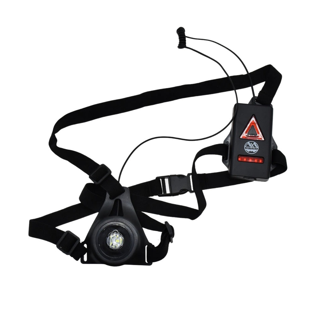 The Six Peaks Running LED Chest Lamp by Six Peaks is a black, adjustable harness for runners, featuring a round chest headlamp and a rectangular control box with LEDs and red triangle, all connected by wires for improved outdoor safety.