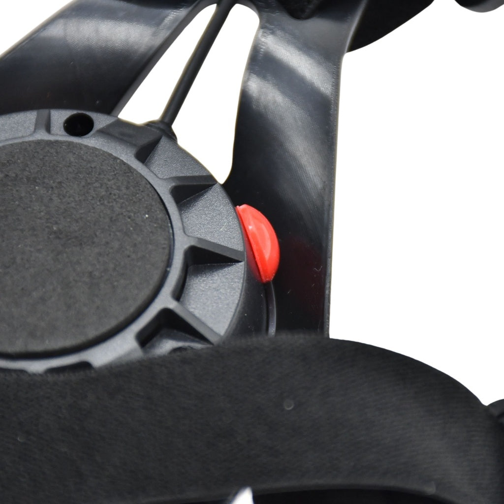 Close-up of the adjustable black mechanism with a round knob and red button on the Six Peaks Running LED Chest Lamp by Six Peaks, designed for outdoor safety, set against a white background.