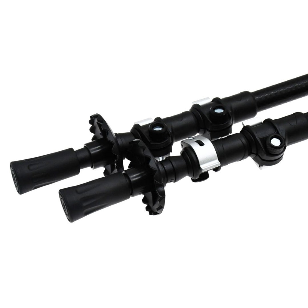 Close-up of Six Peaks Stride Walking Poles—black, adjustable poles with secure locks, rubber tips, and circular grips for stability. Essential hiking gear from Six Peaks for tackling rough terrain.