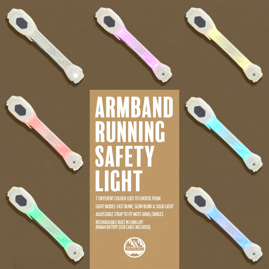 Six Peaks LED Armband Running Safety Light by Six Peaks is shown in six colors around a central box highlighting its rechargeable battery, all set against a brown background.