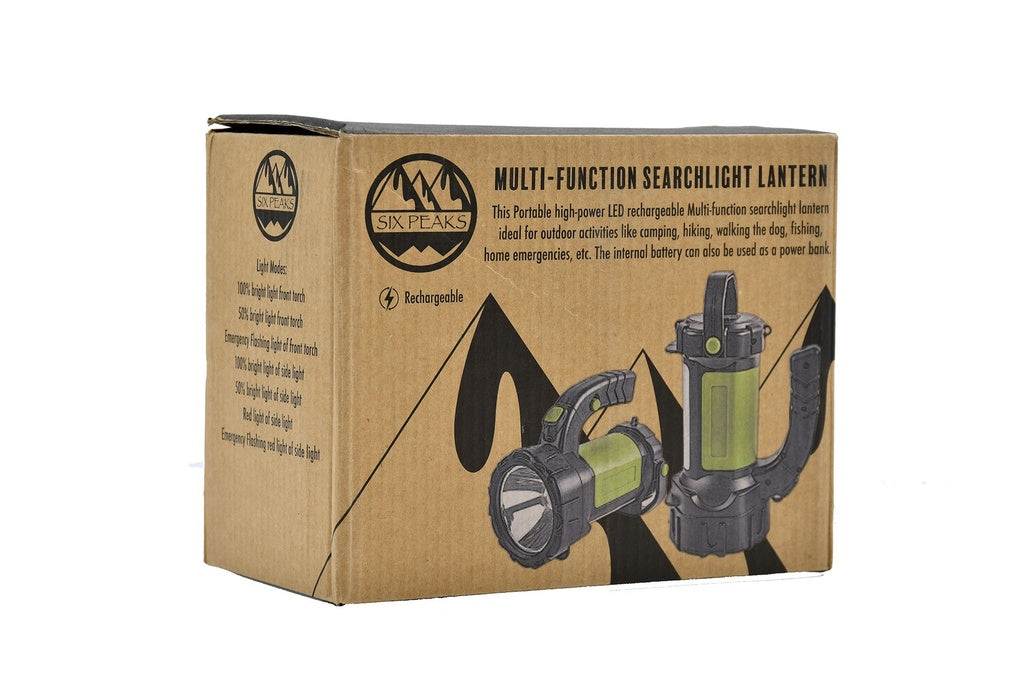 A Six Peaks branded box shows the Six Peaks Multi-function Searchlight Lantern, an LED rechargeable device suitable for camping, outdoor activities, and emergencies.