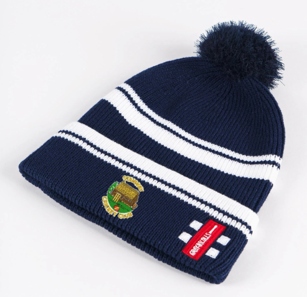 The Gray Nicolls Stanway CC Navy Bobble Hat features white stripes, a fluffy pom-pom, embroidered club logo, and a red patch—ideal for showing your team spirit.