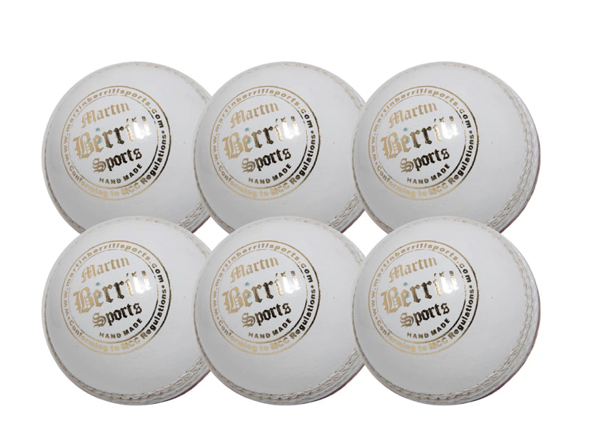 The MBS Supreme Crown Six Pack features six white leather cricket balls with gold and black Martin Berrill Sports branding, arranged in two rows on a plain white background—ideal for training sessions.