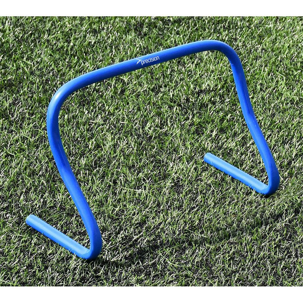 The Precision Training Precision Agility Hurdle, shown on a grassy field, is perfect for sports drills, lateral speed work, and agility exercises.