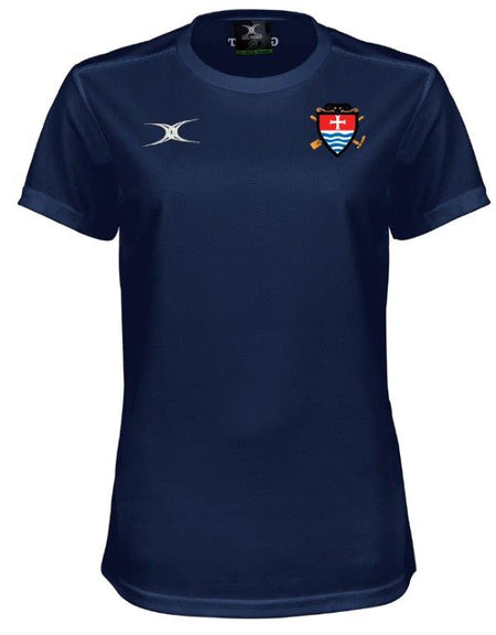 The Gilbert Teign School Womens Photon II T-Shirt is a navy blue high-performance sportswear with a white logo on the right chest and a crest with red shield and white cross on the left, ideal for women’s rugby.