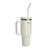 The Urban Fitness VitalSip V2 Bottle is a 1200ml cream insulated stainless steel travel tumbler with handle, silver rim, lid, and reusable straw. Double-wall vacuum insulation keeps drinks fresh. "URBAN FITNESS" printed near the top.