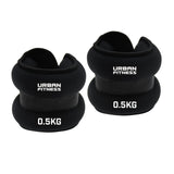 A pair of black Urban Fitness Neoprene Ankle/Wrist Weights, each labeled 0.5KG in white text, displayed on a white background.
