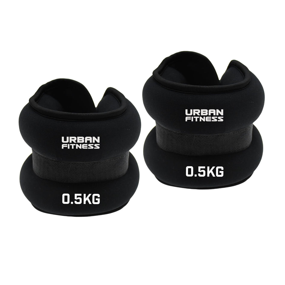 A pair of black Urban Fitness Neoprene Ankle/Wrist Weights, each labeled 0.5KG in white text, displayed on a white background.