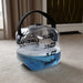 The Urban Fitness Hydro Inertia Kettlebell by Urban Fitness is a clear plastic inflatable kettlebell with a black handle and blue liquid, adjustable from 2.5 kg to 10 kg—perfect for water-based functional training at home.
