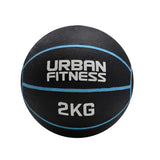 The Urban Fitness Medicine Ball, a black rubber ball with blue lines and "URBAN FITNESS 2KG" in white, is designed to enhance explosive power and functional fitness. Brand: Urban Fitness. Set on a clean white background.