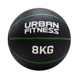 The Urban Fitness Medicine Ball, an 8KG black rubber ball with green lines and white "Urban Fitness" branding, is designed to boost explosive power and functional fitness. It's displayed against a plain white background.