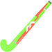 The Mercian Genesis Wood Hockey Stick (22"–32") for youth features a neon green and orange design, a white Mercian logo, and "WIN BEFORE YOU PLAY" printed near the curved end.