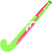The Mercian Genesis Wood Hockey Stick (22"–32") is a youth stick with a neon green hook-shaped end, pink shaft, white geometric accents, and "WIN BEFORE YOU PLAY" text.