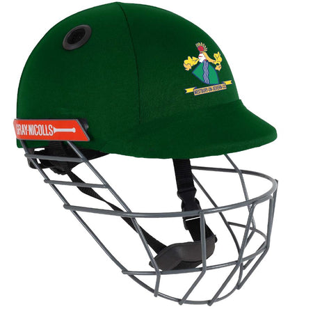 A green Custom Gray Nicolls Cricket Helmet (Helmet Extra) by Gray Nicolls, featuring a metal face guard, the Gray Nicolls logo on the side, and a club crest with yellow birds and a torch on the front.