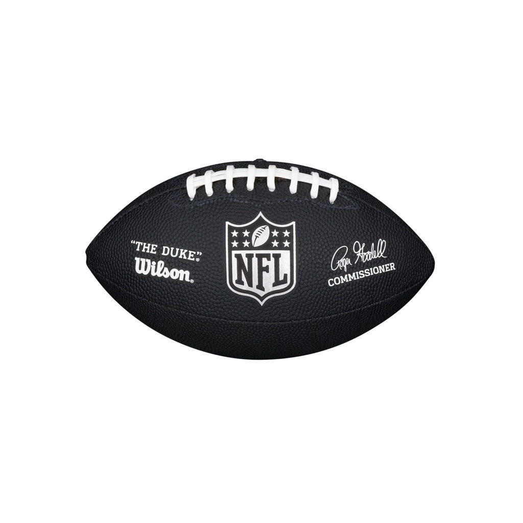 The Wilson NFL Duke Replica American Football features a black design with white laces, the NFL shield logo, THE DUKE branding, and the commissioner's signature. Built by Wilson, it offers durable construction for lasting play.