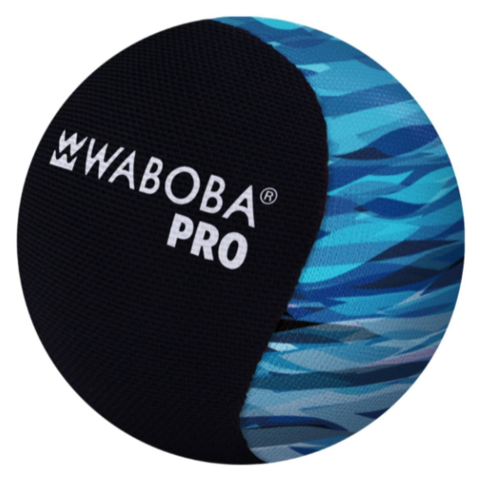 A close-up of the Waboba Pro Ball by Waboba, showing its black panel with a white logo and blue camouflage design on this advanced water bouncing toy.