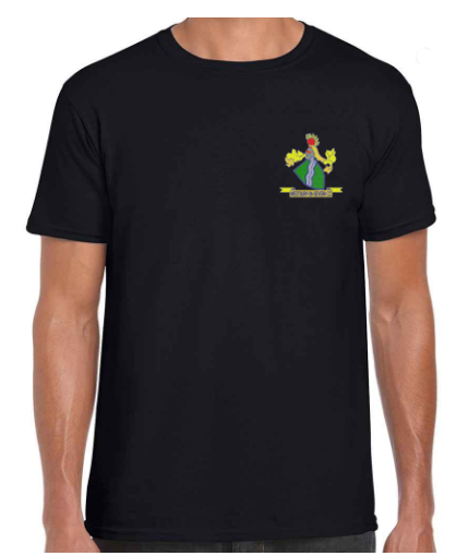A person wears a black PenCarrie Westbury-on-Severn CC Gilden Mens T-Shirt featuring a small, colorful graphic of a woman holding yellow flowers and a green banner on the left chest.