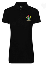The PenCarrie Westbury-on-Severn CC RTX Ladies Polo is a black, short-sleeve, collared shirt with three buttons and the club’s colorful badge on the left chest.