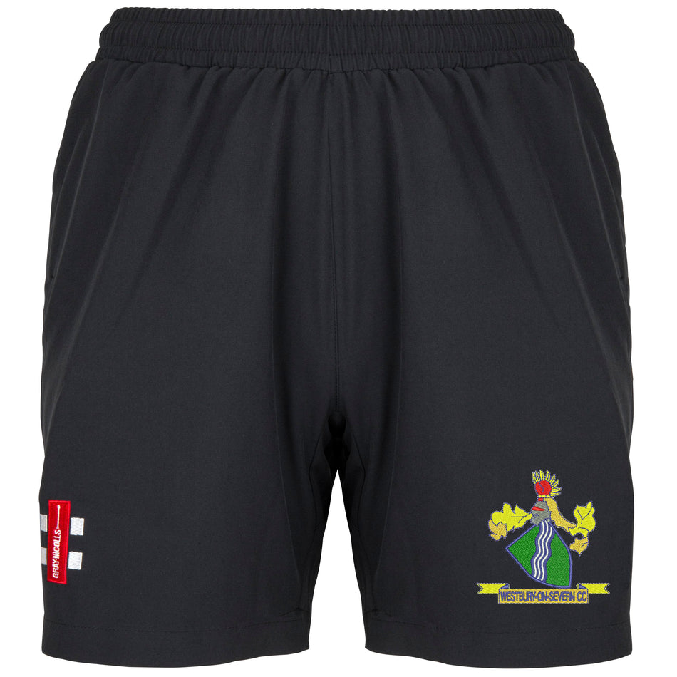 Gray Nicolls Westbury-on-Severn CC Velocity Ladies Shorts in black feature a colorful club crest on the right leg and a red patch with white text on the left, shown against a white background.