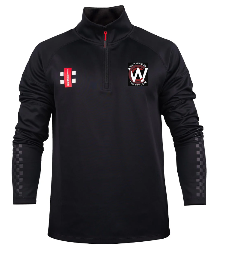 The Gray Nicolls Whitminster CC Pro Thermo Fleece is a black, long-sleeve pullover with grey checkered sleeves, red zipper, red & white logo on the left chest, and a matching patch on the right—perfect for Whitminster CC players.