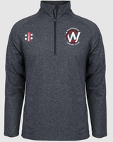 The Gray Nicolls Whitminster CC Velocity Mid Layer is a dark grey, long-sleeve quarter-zip pullover with moisture control, stretch fit, stand-up collar, club name and W logo on the left chest, and a red-white emblem on the right.