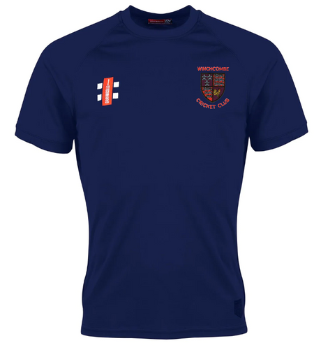 The Gray Nicolls Winchcombe CC Matrix V2 T-Shirt in navy features short sleeves, moisture-wicking fabric, the club badge, bold white and red logo, and two vertical white bars—perfect for active training.