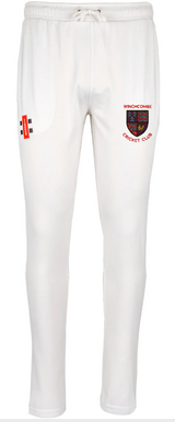 The Gray Nicolls Winchcombe Pro Performance Cricket Trousers feature an elastic waistband with drawstring, a red, yellow, and blue crest on the left thigh, and a small red and black logo on the right for comfort and style.