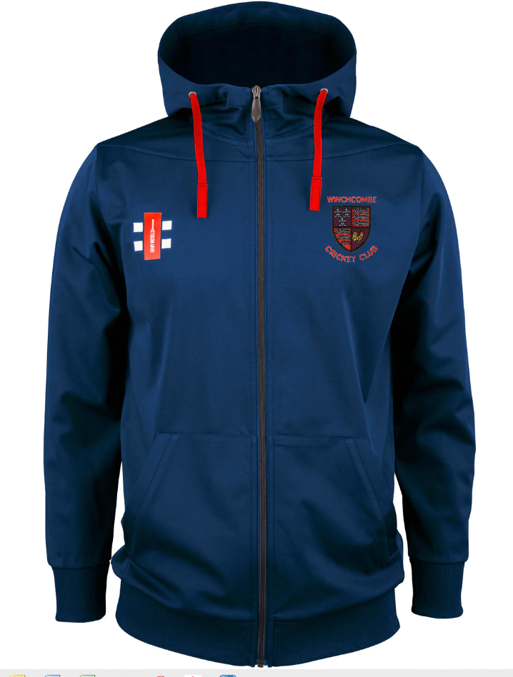The Gray Nicolls Winchcombe CC Pro Performance Hooded Top features navy blue fabric, red drawstrings, zip closure, two front pockets, the cricket club crest on the left chest, and a white-blue flag with a red logo on the right.