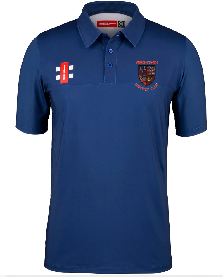 A navy Gray Nicolls Winchcombe CC Pro Performance Polo Shirt with short sleeves, button-up collar, club crest on the left chest, moisture-wicking fabric, and two white stripes plus a red label accent on the right chest.