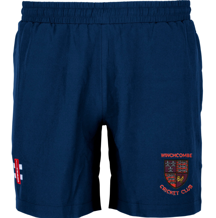 The Gray Nicolls Winchcombe CC Velocity Shorts feature an elastic waistband, the club crest on the right leg, and an England flag patch on the left—perfect for cricketers wanting comfort and style.