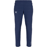 The Gilbert Womens Synergie V3 Trouser by Gilbert features a dark navy color, elastic waistband, white curved logo on the left thigh, and a small vertical white text logo near the ankle, shown against a white background.