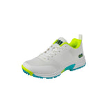 The Gunn & Moore Aion All Rounder Cricket Shoe 2024 is a lightweight athletic shoe with green accents, a blue and green sole, breathable mesh details, and GM branding on the tongue and side, displayed at an angle on a white background.