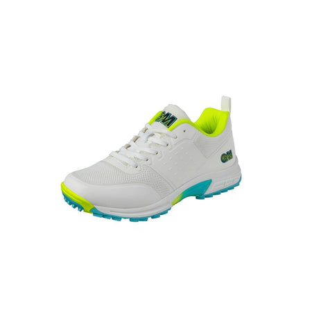 The Gunn & Moore Aion All Rounder Cricket Shoe 2024 is a lightweight athletic shoe with green accents, a blue and green sole, breathable mesh details, and GM branding on the tongue and side, displayed at an angle on a white background.