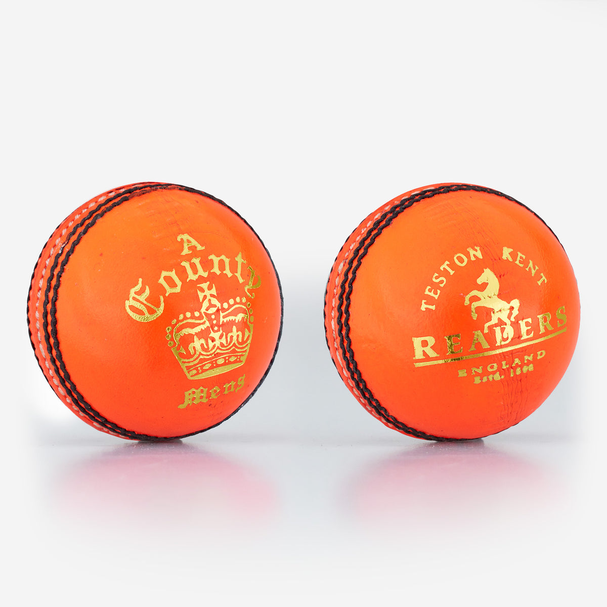Two bright orange Readers County Crown Coloured Cricket Balls are shown, featuring black stitching and gold detailing. Ideal for evening matches or training, each ball is branded with the distinctive Readers name.