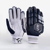 The Kookaburra 2.1 T/20 Batting Gloves by Kookaburra feature a navy palm side in supple sheep leather with perforations, and a padded back with black, grey, and white high-density foam detailing plus a stylized logo.