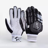 The Kookaburra 2.1 T/20 Batting Gloves by Kookaburra feature premium sheep leather palms, high-density foam padding, and a striking black design with grey and white details—offering both ventilation and protection for cricketers.