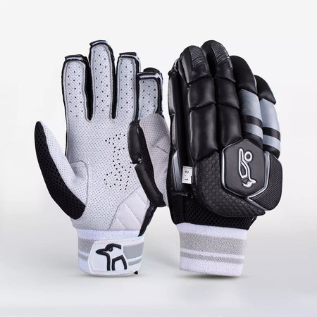The Kookaburra 2.1 T/20 Batting Gloves by Kookaburra feature premium sheep leather palms, high-density foam padding, and a striking black design with grey and white details—offering both ventilation and protection for cricketers.