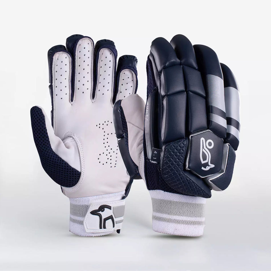 Kookaburra 4.1 T/20 Batting Gloves by Kookaburra feature premium navy leather, a white ventilated palm, and a padded black and gray back for finger protection, all with a sporty design and branded wrist strap.