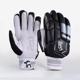 Kookaburra 4.1 T/20 Batting Gloves by Kookaburra in black, shown upright—one displays the ventilated white and gray palm for finger protection, the other reveals the black padded back with a white logo and striped design, both in premium leather.