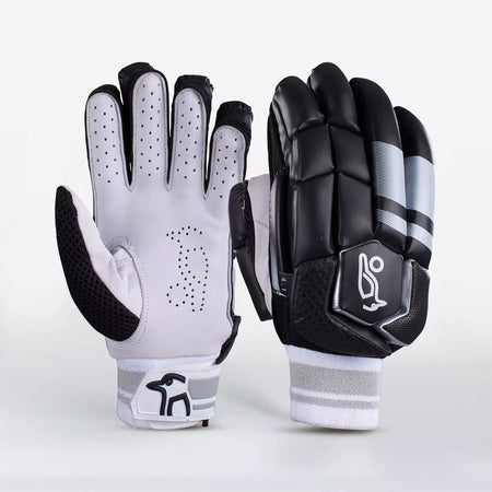 Kookaburra 4.1 T/20 Batting Gloves by Kookaburra in black, shown upright—one displays the ventilated white and gray palm for finger protection, the other reveals the black padded back with a white logo and striped design, both in premium leather.